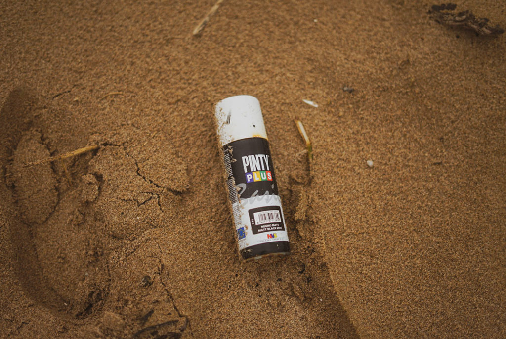 Spray en arena playa